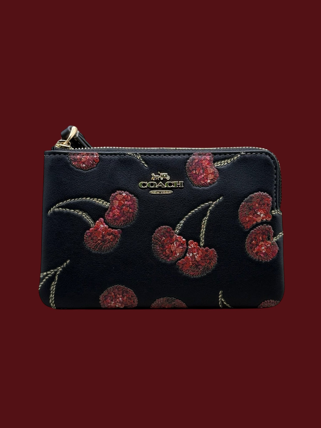 Cartera coach Cereza