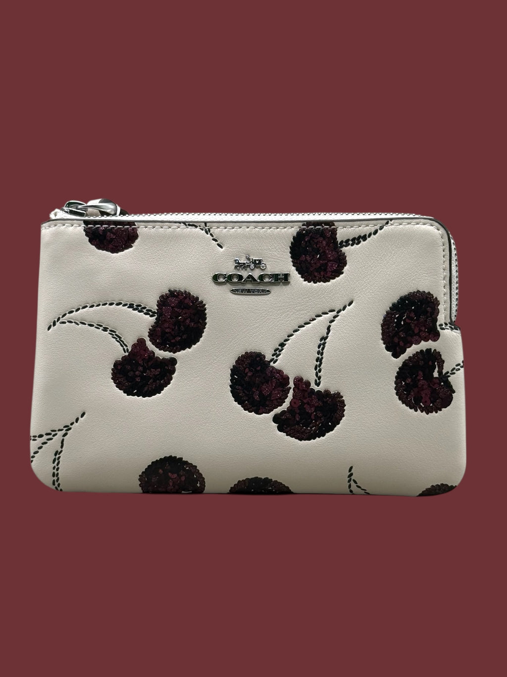 Cartera coach Cereza